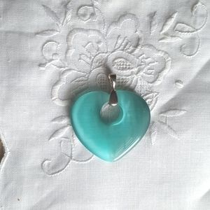 Teal blue tiger cat eye heart-shaped stone pendant with silver